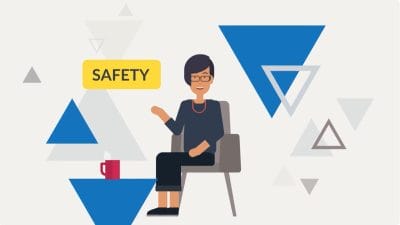 Woman sitting on a chair as part of workers compensation insurance program.